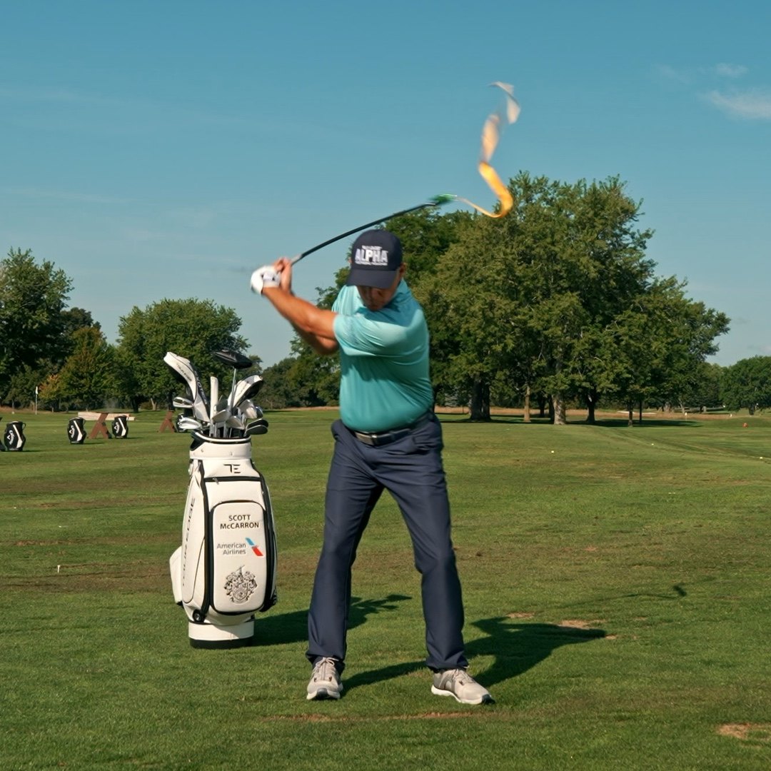PGA Tour champion Scott McCarron swinging the TA25R golf swing trainer with resistance ribbon